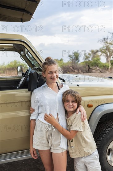 Brother (8-9) and sister (16-17) on safari