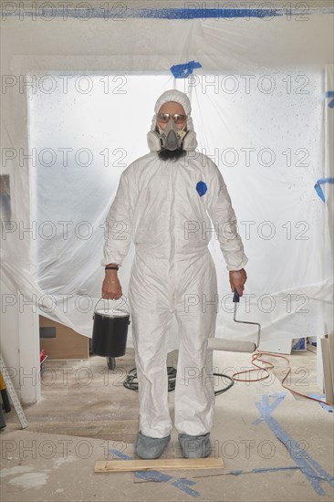 House Painter wearing protective suit and mask