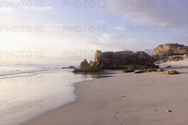 Rock formations on Sopiesklip beach in Walker Bay Nature Reserve