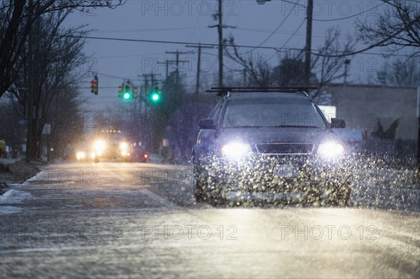 Cars driving in snowstorm