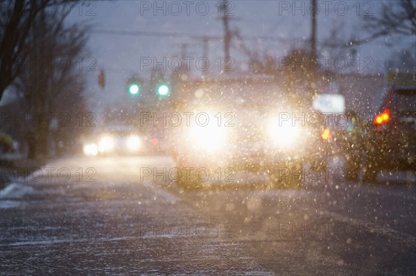 Cars driving in snowstorm