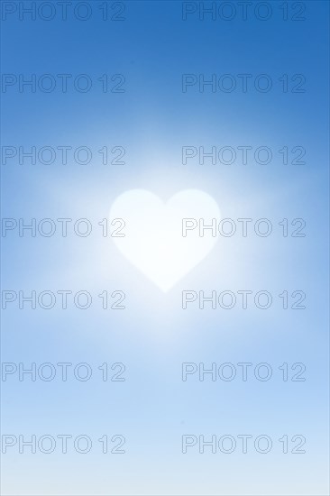 White heart against blue sky