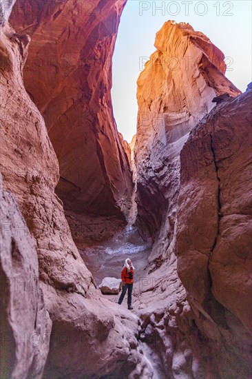 Senior female hiker standing in canyon