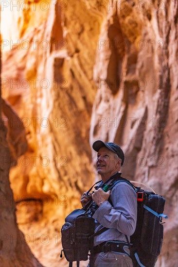 Senior hiker exploring rock formations in Kodachrome Basin State Park near Escalante Grand Staircase National Monument