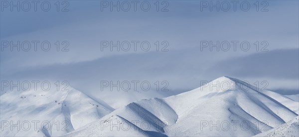 Scenic view of snowcapped mountains