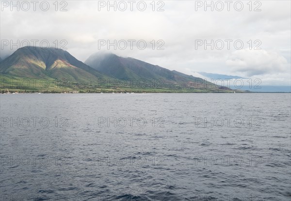 Scenic view of hills and water