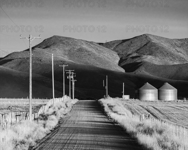 Country road leading to mountains