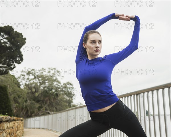 Woman stretching outdoors