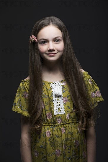 Studio portrait of smiling girl