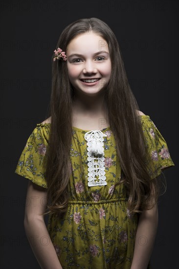 Studio portrait of smiling girl