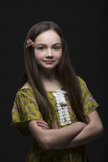 Studio portrait of smiling girl