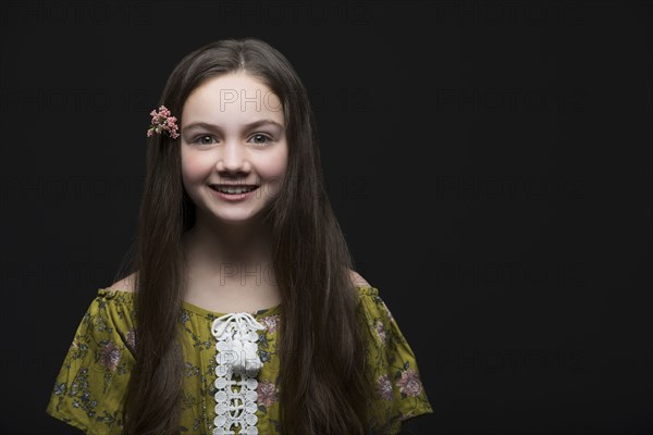 Studio portrait of smiling girl