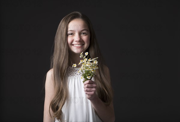 Studio portrait of smiling girl