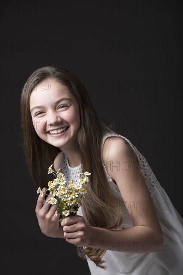 Studio portrait of smiling girl