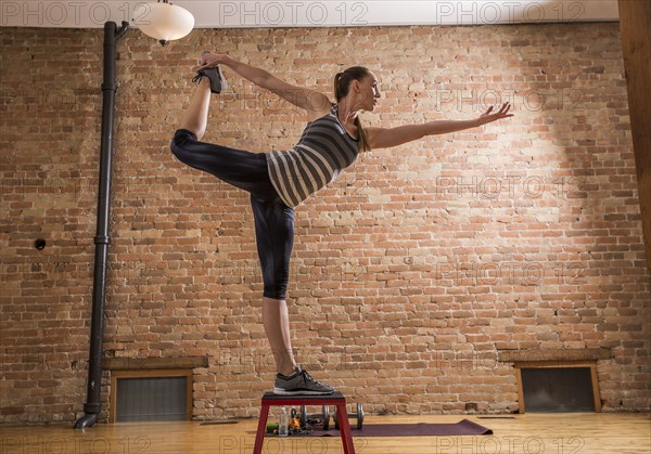 Woman exercising in gym