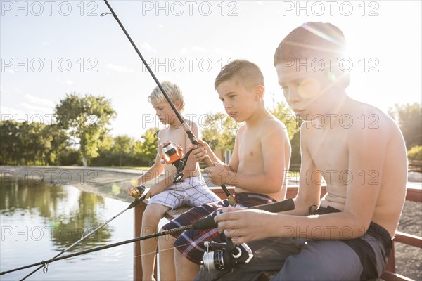 Three shirtless boys