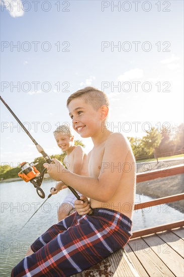 Smiling shirtless boys