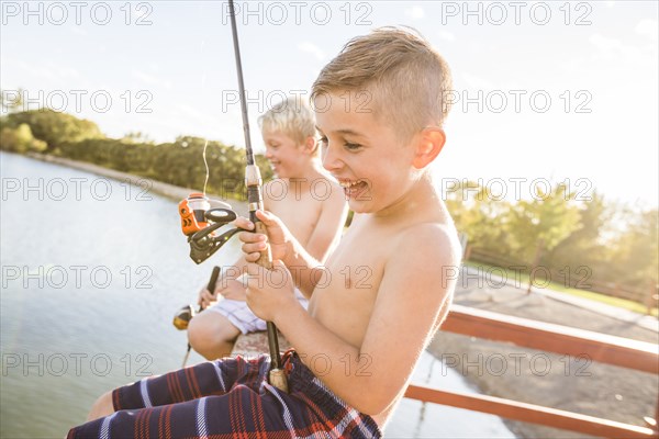 Smiling shirtless boys