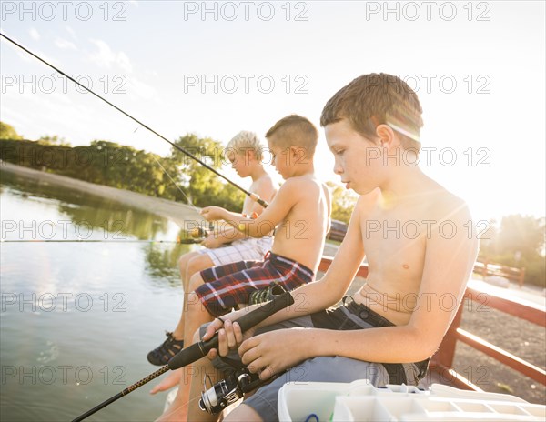 Three shirtless boys