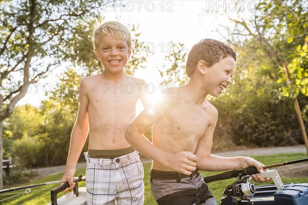 Smiling shirtless boys