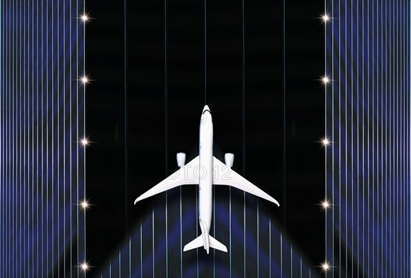 Overhead view of airplane on runway
