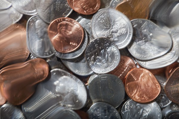 Close-up of distorted US coins