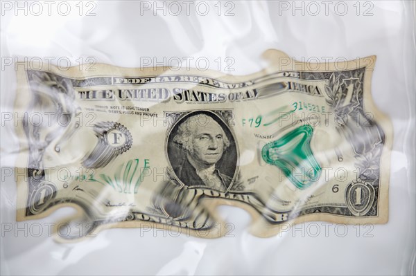 Distorted one dollar bill