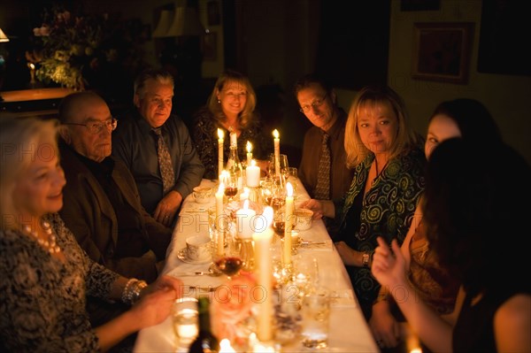 Group of friends celebrating in restaurant