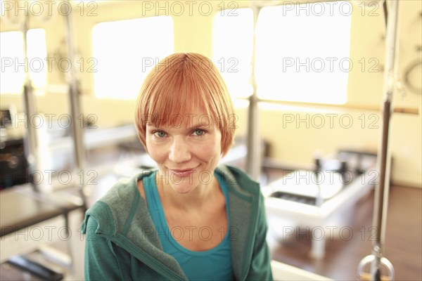 Portrait of fitness trainer in gym