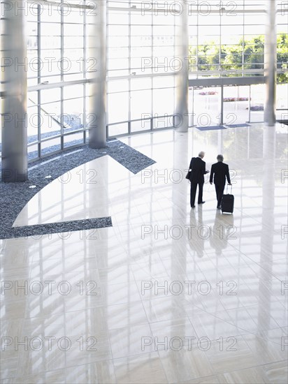 Two businessmen in lobby