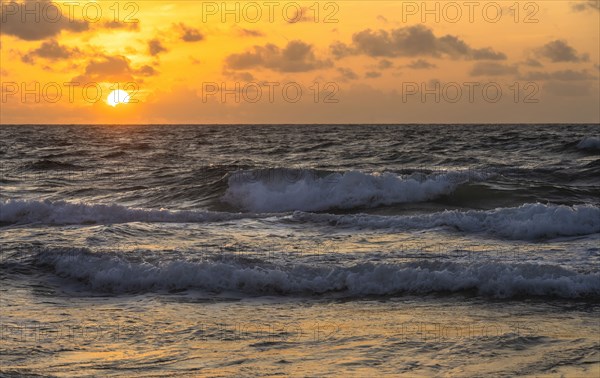 Ocean waves at sunrise