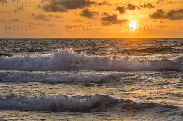 Ocean waves at sunrise