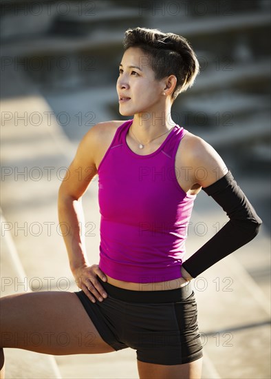 Portrait of athlete woman with amputated hand