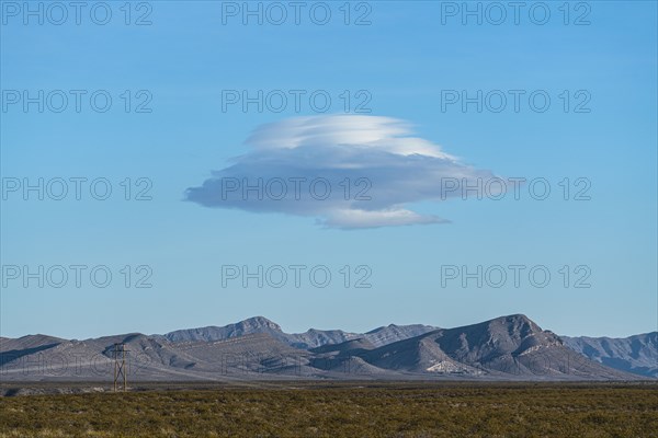 Lenticular cloud over landscape