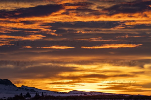 USA, Idaho, Bellevue, Dramatic sunrise sky above snow covered landscape