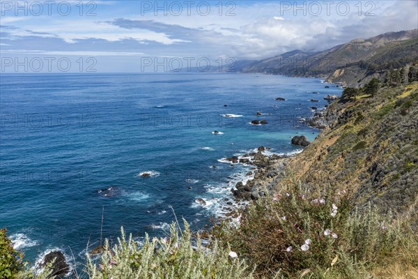 Ocean waves crashing against Big Sur coast