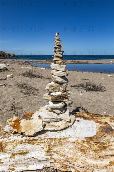 Stone carin on beach