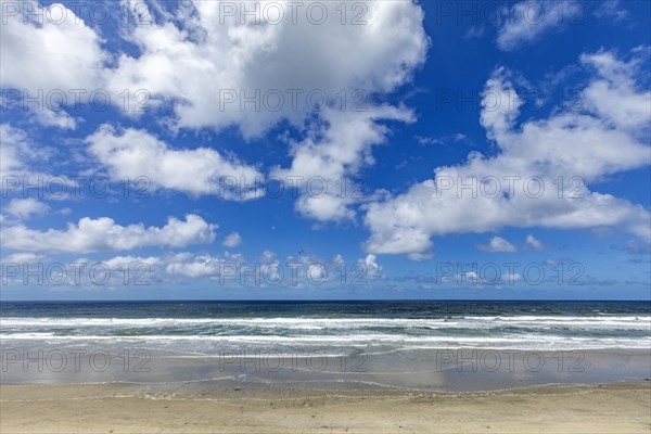 White clouds on blue sky at seaside