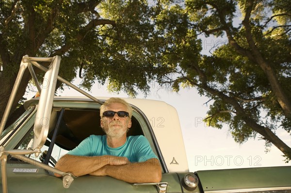 Man in pick-up truck