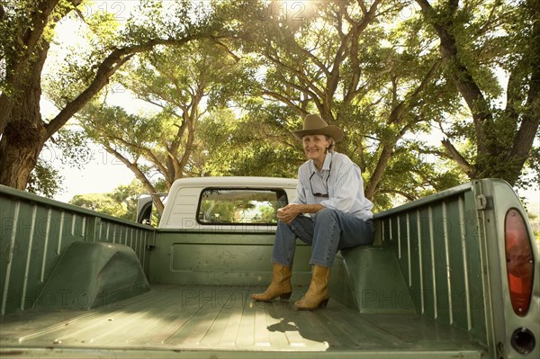 Woman on pick-up truck