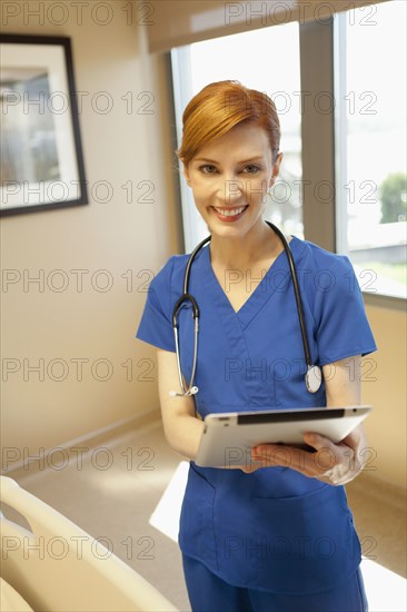 Female doctor with digital tablet