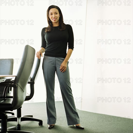 Portrait of businesswoman in boardroom