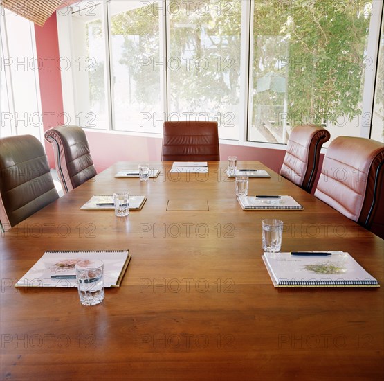 Empty conference room with paperwork