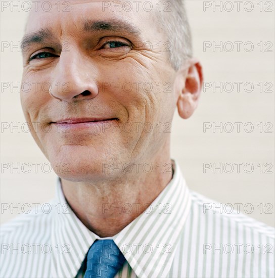 Portrait of smiling businessman