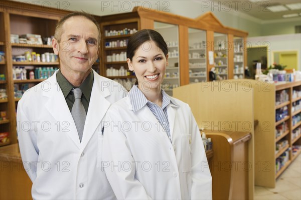 Portrait of two pharmacists in pharmacy