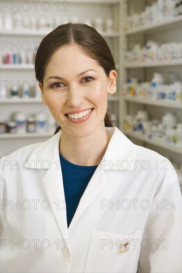 Portrait of female pharmacist in pharmacy