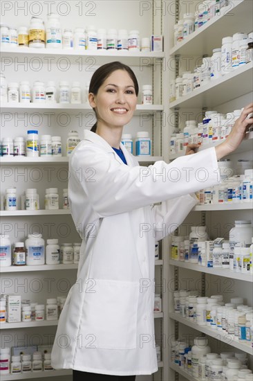 Portrait of female pharmacist in pharmacy