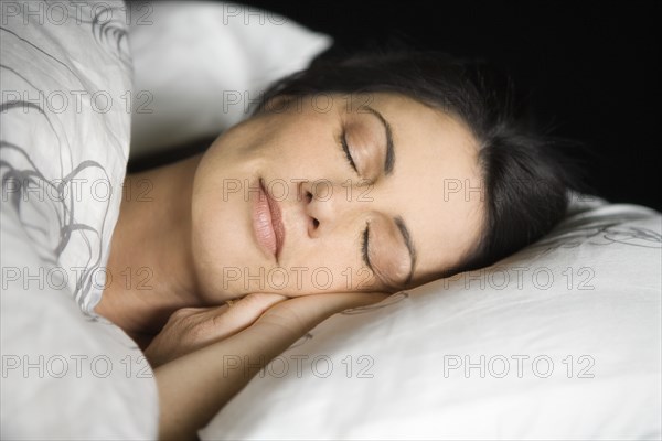 Woman sleeping in bed