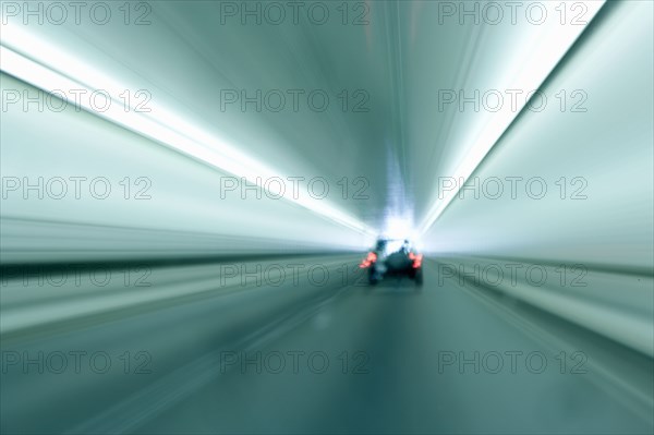 Car travelling in tunnel