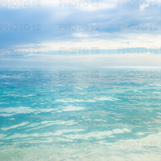 Blue sky over calm sea